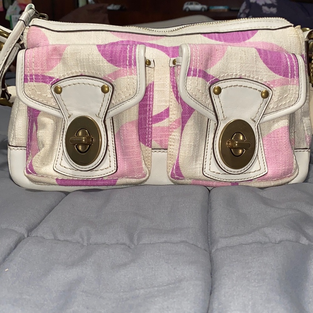 COACH Pink and cream hand bag.